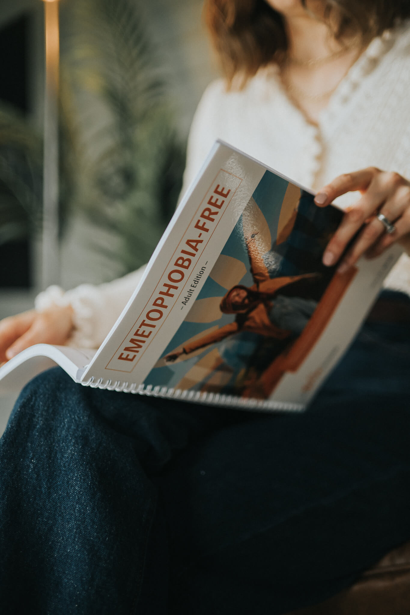 Michelle holding the Emetophobia-Free workbook